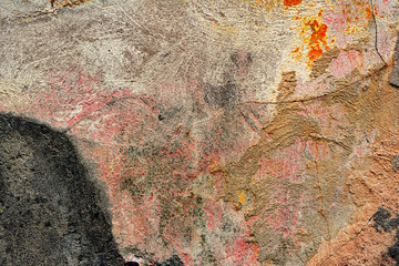 Texture of a concrete wall with cracks and scratches which can be used as a background
