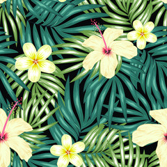 Tropical seamless pattern with palm leaf hibiscus and plumeria flower