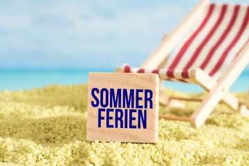 Strand, Sonnenliege und die Sommerferien