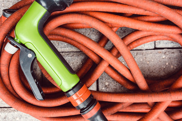 Water Hose In A Backyard