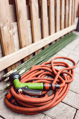 Water Hose In A Backyard