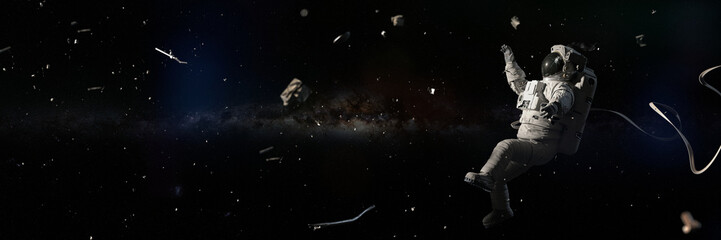 astronaut hit by space debris in orbit of planet Earth  © dottedyeti
