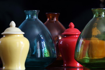 Colourful glass and ceramic containers