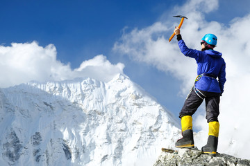 Hiking in Himalaya mountains. Woman climber hiking in the Mountains. mountaineering sport lifestyle concept