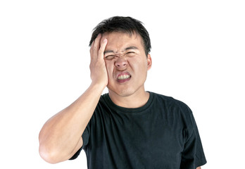 Asian man suffering from headache wearing black t-shirt isolated on white background.