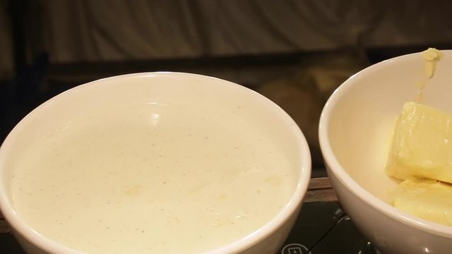butter slices with sweet soup in white bowl