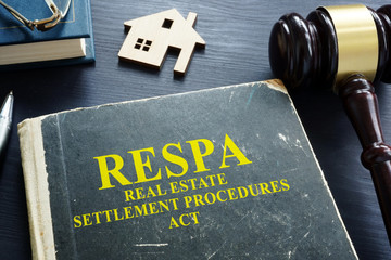Real estate settlement procedures act RESPA on the desk. - obrazy, fototapety, plakaty