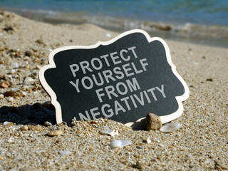 Plate with sign Protect Yourself from Negativity.