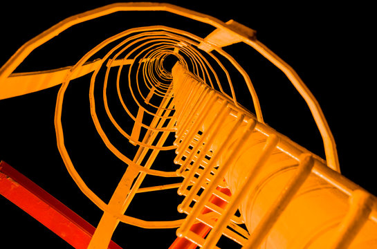 Ladder on a lightning rod against the night sky