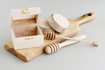 Wooden objects isolated on grey background.