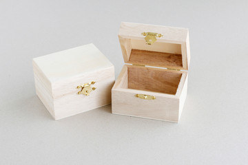 Wooden boxes on grey background
