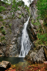 waterfall in forest in northwest Scotland