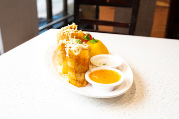 South Indian Cheese Spring Dosa Also Know as Cheese Masala Dosa or Masala Dosa Served With Coconut Chutney, Sauce And Sambar