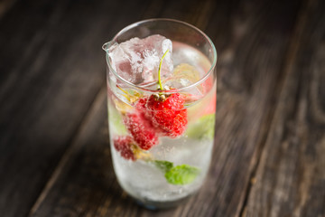 Raspberry mojito cocktail on the rustic background. Selective focus. Shallow depth of field.