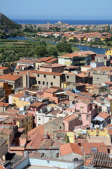 Fototapeta na wymiar aerial view of the beautiful city of Bosa on the Sardinian coast, crossed by the navigable river Temo