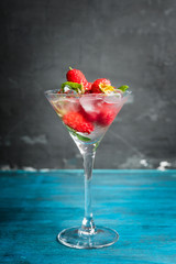 Raspberry martini cocktail. Selective focus. Shallow depth of field.