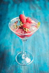 Raspberry martini cocktail. Selective focus. Shallow depth of field.