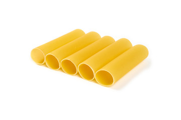 Italian cannelloni pasta tubes isolated over white background.