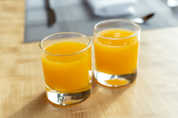 Fresh orange juice on table