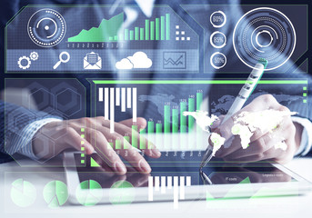Businessman analysis trading diagram at tablet