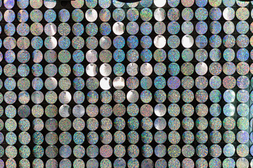 Silver sparkle glitter background with shiny sequins for design