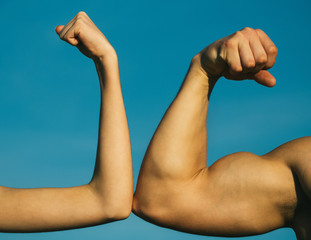 Competition, strength comparison. Vs. Fight hard. Health concept. Hand, man arm, fist. Musclar arm...