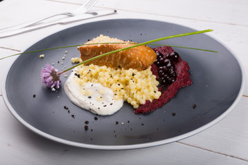 Salmon steak served with risotto