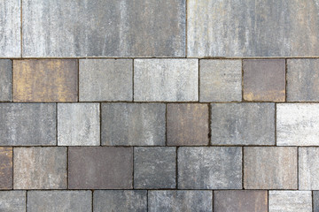 new modern granite tiles on the footpath. texture and backdrop for text and design