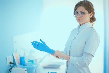 Fototapeta premium female pediatrician / doctor at work in clinic, concept of female child doctor in modern medical clinic