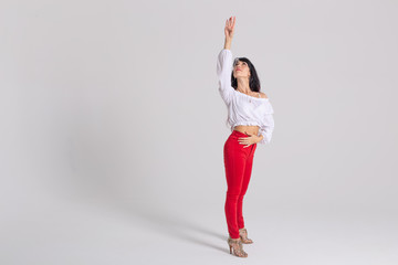 Latino dance, Improvisation, contemporary and vogue dance concept - young beautiful woman dancing...