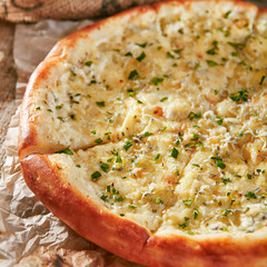 Pizza Restaurant Menu - Delicious Fresh Pizza 4 cheese. Pizza on Rustic Wooden Table with Ingredients