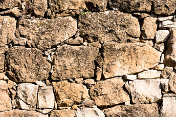 Ancient stone wall in a rural zone. Old stones texture. Dry stone "pedras Seca" . Outdoors txtured.