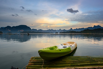 Kayaking floats on the water and Twilight sky in the evening