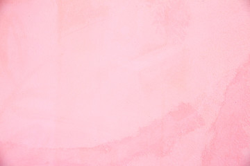 Pink coloured concrete background. Wall texture.