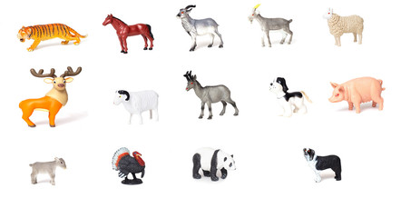 Set of toy wild and domestic animals for children to play, white background, isolate