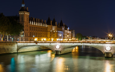 Naklejka na ściany i meble Night panoramic cityscape of Seine river and Paris, France, Europe. Seine is famous tourist destination with many landmarks. View of Seine postcard in Paris