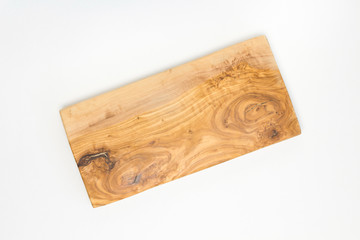 Wooden cutting board from olive tree on white background. Cooking, recipe concept. Top view, flat lay, mock up, copy space