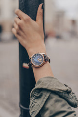 Stylish beautiful watch on woman hand