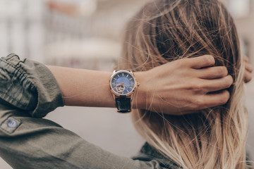 Stylish casual watch on woman hand