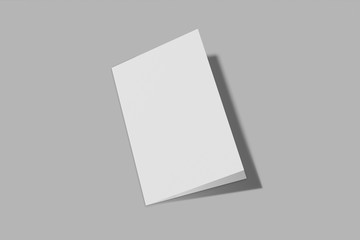 Mockup vertical booklet, brochure, invitation isolated on a grey background with hard cover and realistic shadow. 3D rendering.