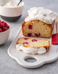Cake with raspberries and whipped cream. Copy space.