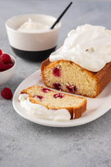 Cake with raspberries and whipped cream. Copy space.
