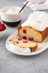 Cake with raspberries and whipped cream. Copy space.