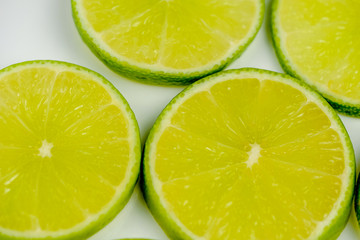 lemon, Juicy slice of lime isolated on white background