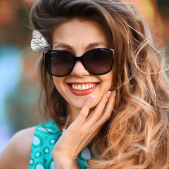 Naklejka premium portrait temptation girl finger mouth lips / young adult sexy girl, concept female beauty, smilling