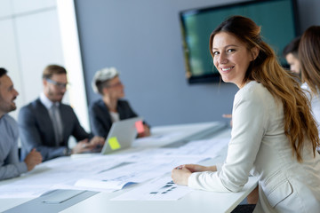 Group of architects and business people working together and brainstorming