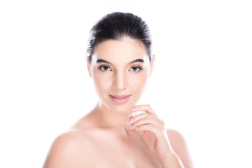 Obraz na płótnie Canvas Beauty woman face isolate in white background. Young caucasian girl, perfect skin, cosmetic, spa, beauty treatment concept. One finger touching jaw, smile.