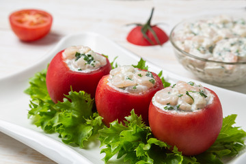 Tomatoes stuffed with shrimp. Belgian national snack