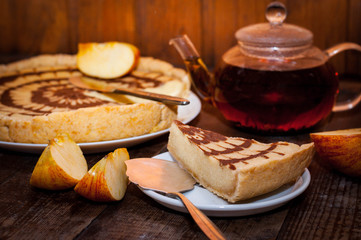 Cottage cheese shortbread on dark background with apples and tea in rustic or rustic style