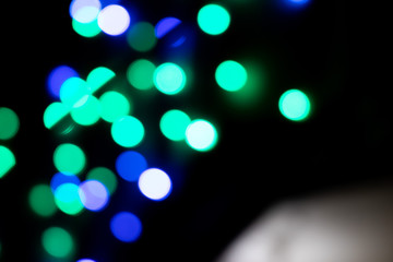Light abstract bokeh background by blur or defocused at light element use for background or wallpaper in new year diwali christmas marriage celebration